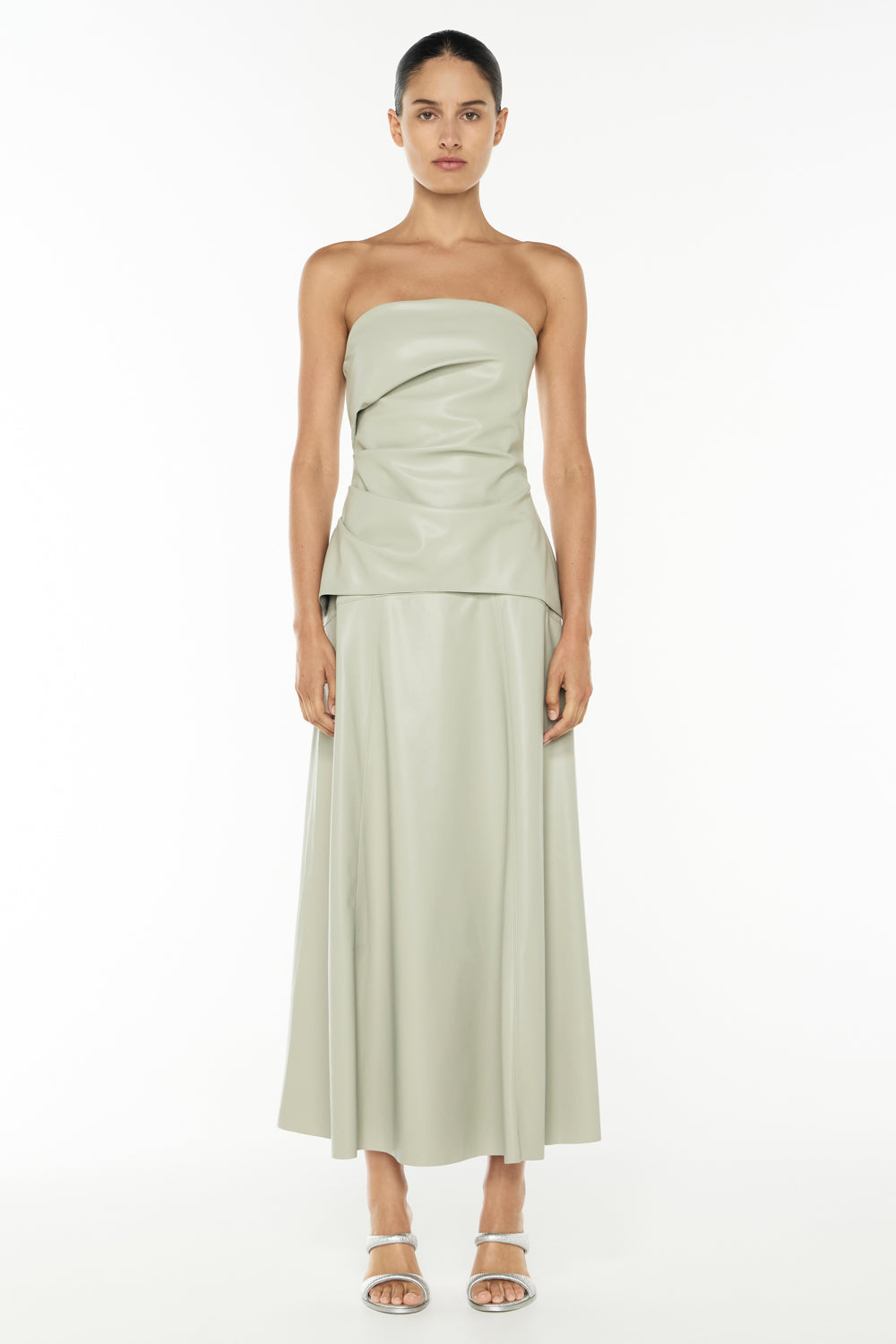 Image of a model wearing Tops. Productname: Infinite Limits Bustier in SAGE colour by brand - Manning Cartell