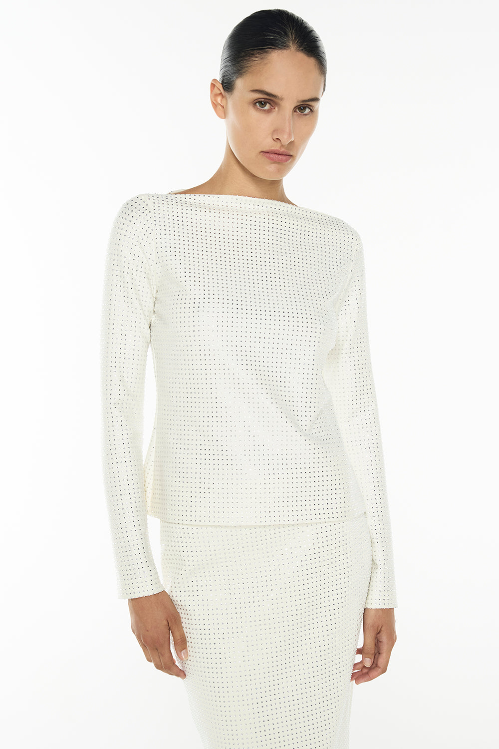 Image of a model wearing Tops. Productname: Diamante Brilliante Top in White colour by brand - Manning Cartell