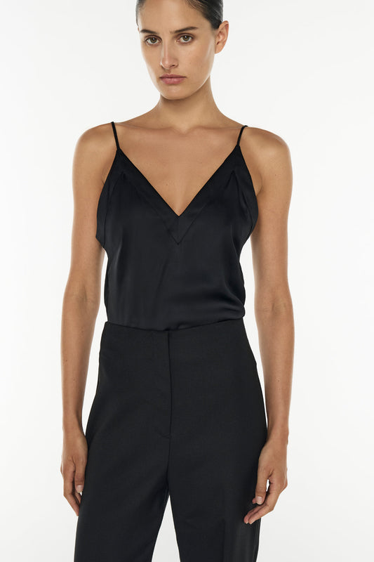 Image of a model wearing Tops. Productname: Under All Cami in BLACK colour by brand - Manning Cartell