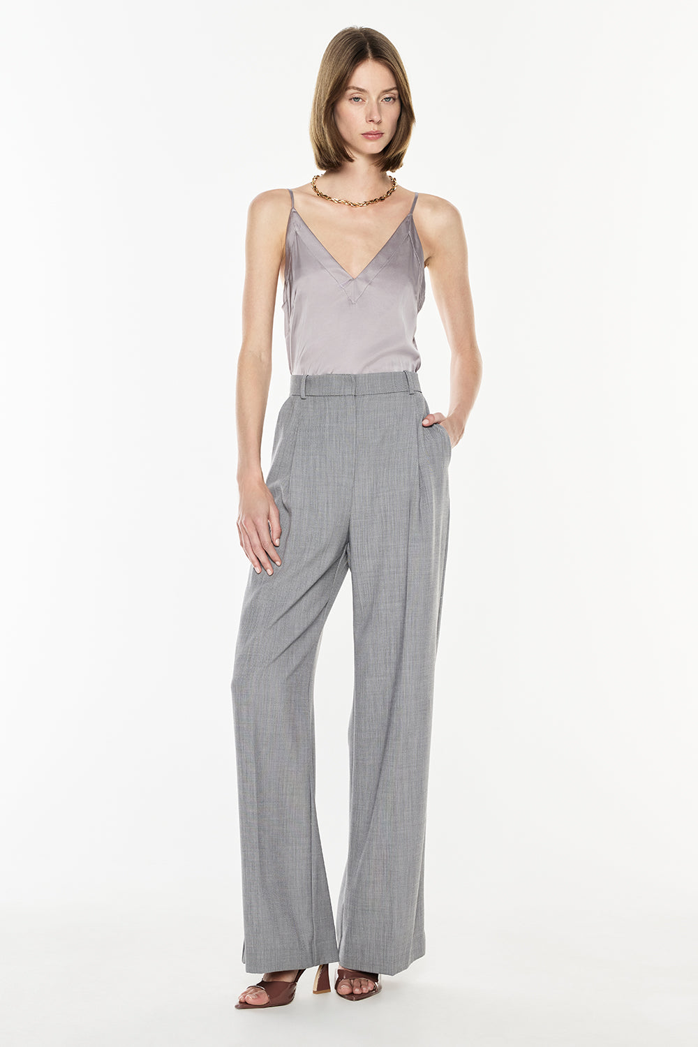 Image of a model wearing Tops. Productname: Under All Cami in Grey colour by brand - Manning Cartell