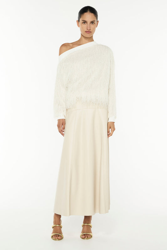 Image of a model wearing Skirts. Productname: Infinite Limits Skirt in NOUGAT colour by brand - Manning Cartell