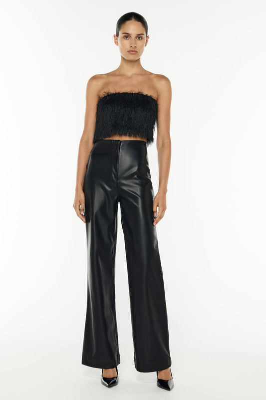 Image of a model wearing Tops. Productname: On The Fringe Knit Bustier in Black colour by brand - Manning Cartell