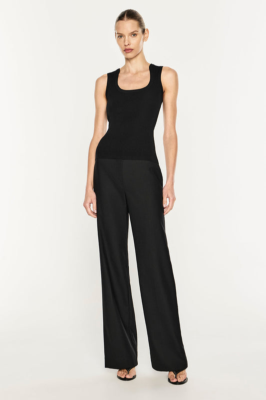 Image of a model wearing Tops. Product name - Go Figure Knit Tank in Black colour by brand - MANNING CARTELL