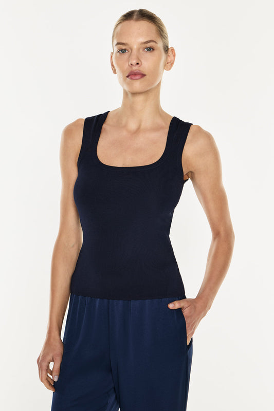 Image of a model wearing Tops. Productname: Go Figure Knit Tank in Navy colour by brand - Manning Cartell