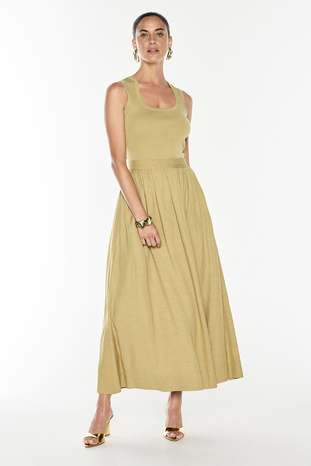 Image of a model wearing Tops. Productname: Go Figure Knit Tank in Khaki Gold colour by brand - Manning Cartell