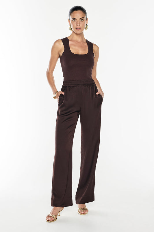 Image of a model wearing Pants. Productname: Glossed Over Pull On Pant in Truffle colour by brand - Manning Cartell