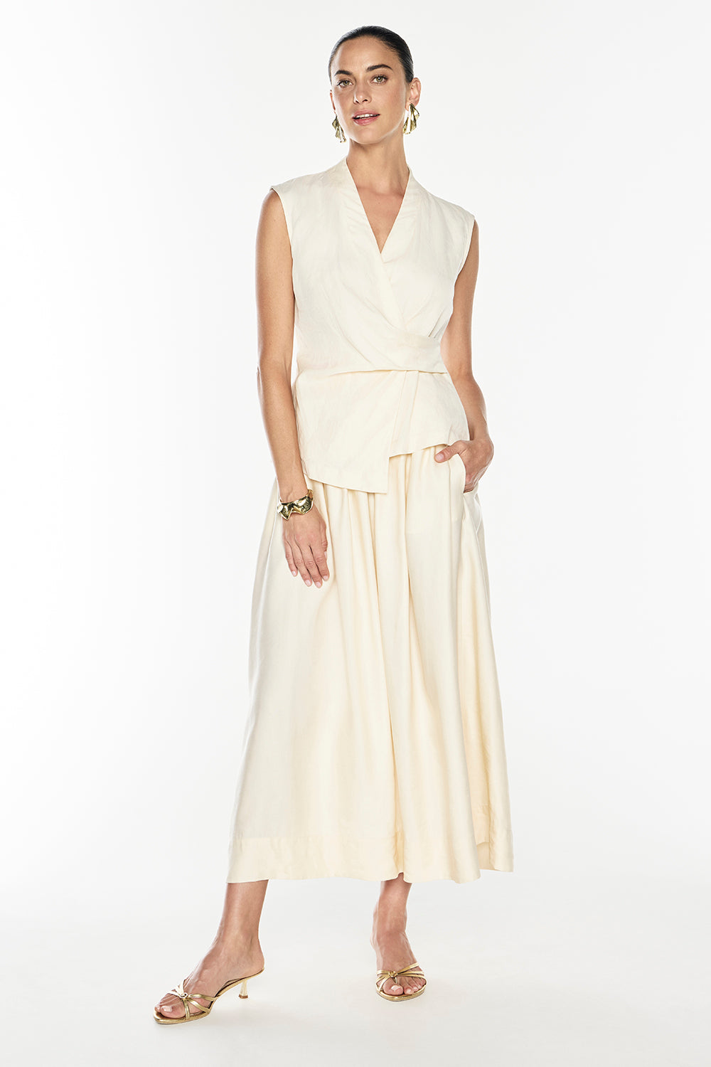 Image of a model wearing Skirts. Productname: Love Philosophy Skirt in Champagne colour by brand - Manning Cartell