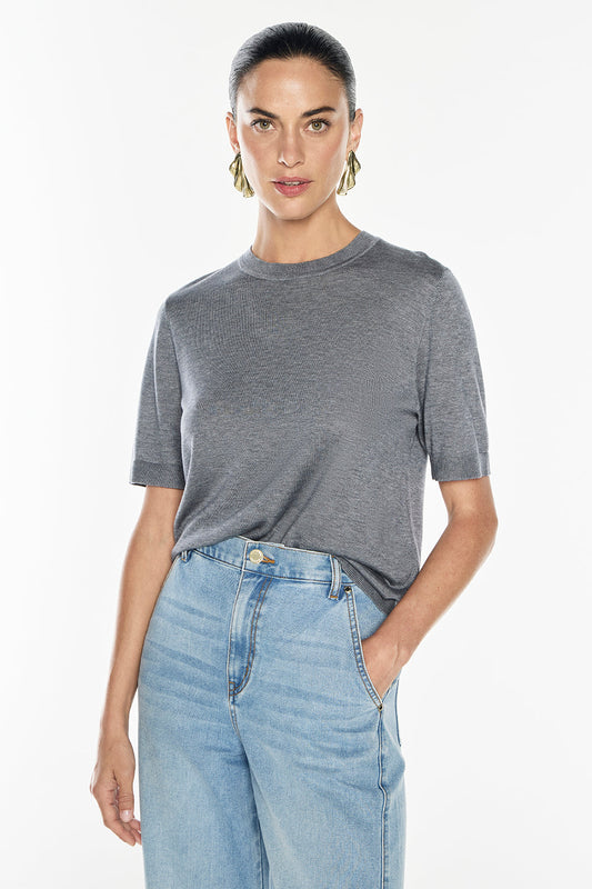 Image of a model wearing Tops. Productname: Melody Knit Top in Graphite colour by brand - Manning Cartell