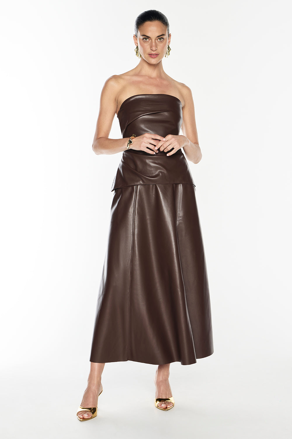 Image of a model wearing Skirts. Productname: Music & Lyrics Skirt in Mocha colour by brand - Manning Cartell