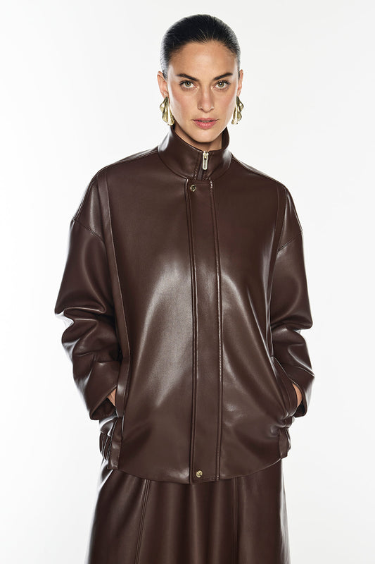 Image of a model wearing Outerwear. Productname: Music & Lyrics Bomber in Mocha colour by brand - Manning Cartell