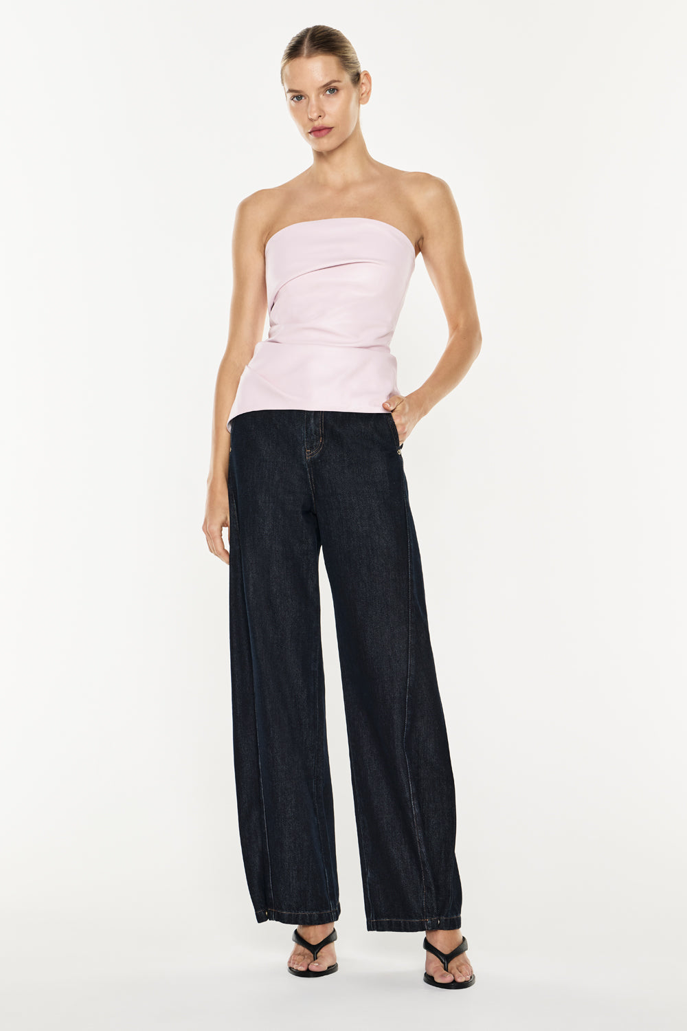 Image of a model wearing Tops. Productname: Limitless Love Bustier in Pink colour by brand - Manning Cartell