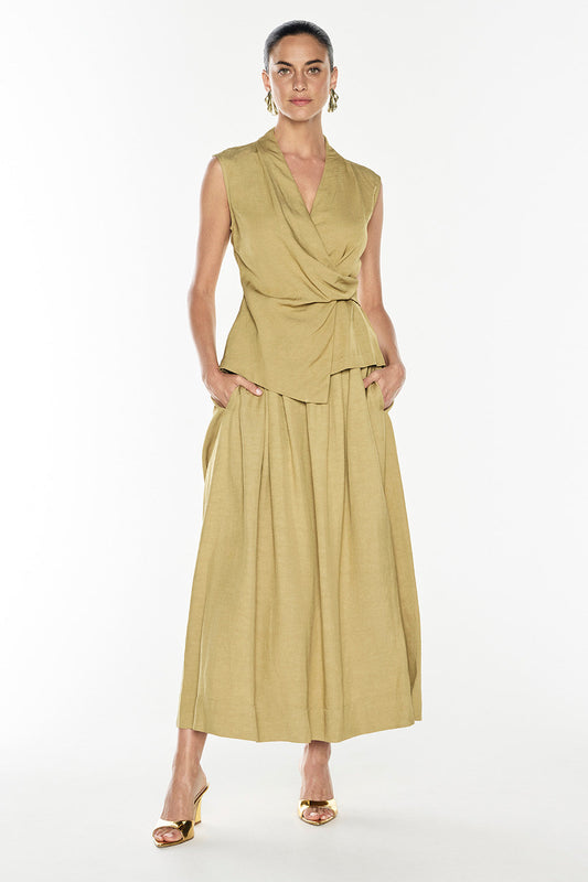 Image of a model wearing Skirts. Productname: Final Note Skirt in Khaki Gold colour by brand - Manning Cartell