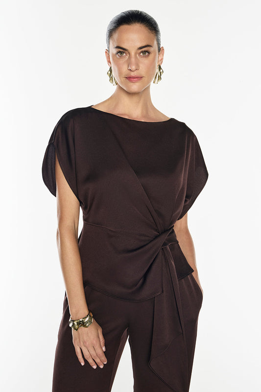 Image of a model wearing Tops. Productname: Glossed Over Drape Top in Truffle colour by brand - Manning Cartell