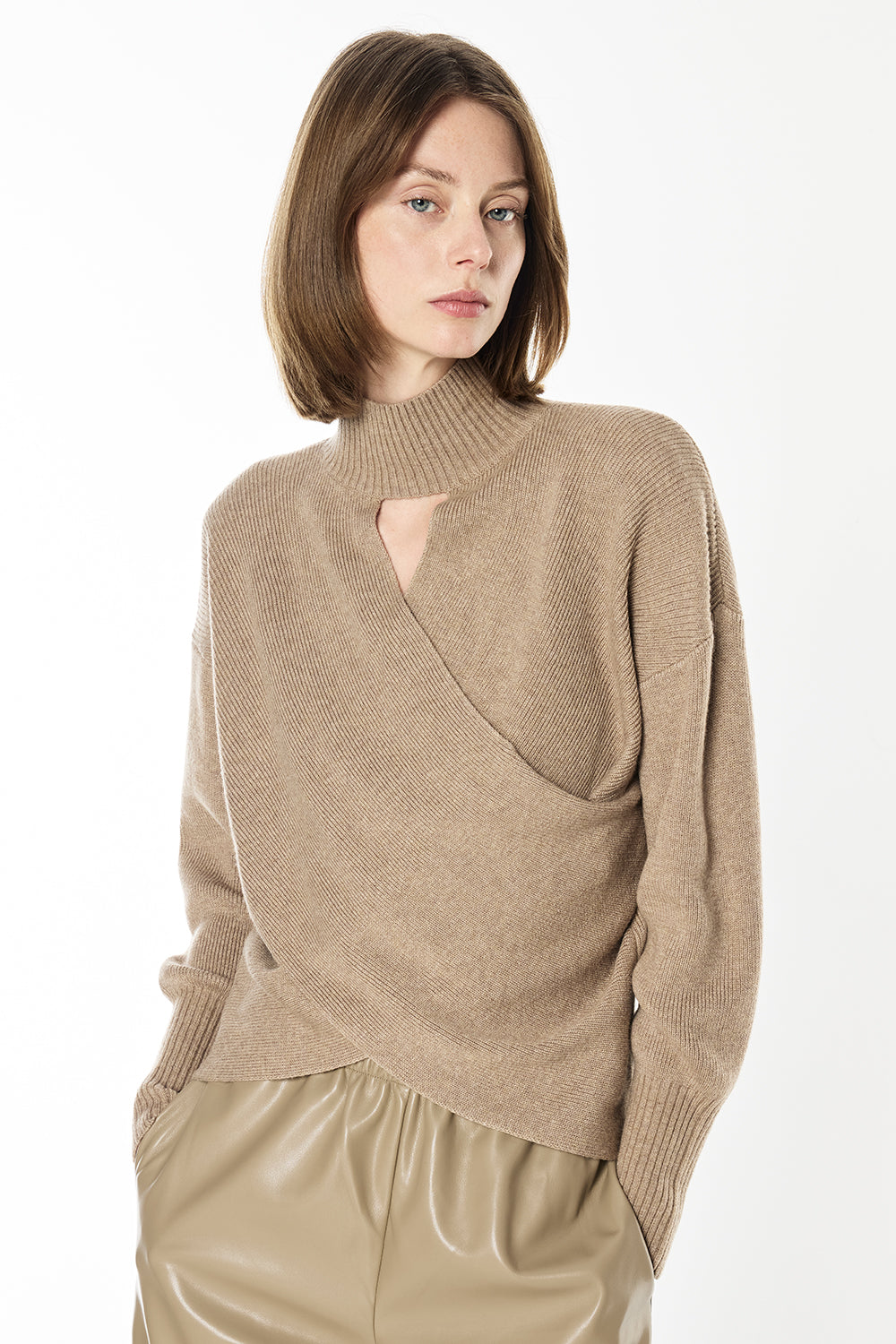 Image of a model wearing Tops. Productname: Style Smarts Knit Top in Taupe colour by brand - Manning Cartell