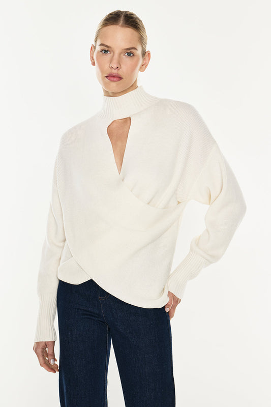 Image of a model wearing Tops. Productname: Style Smarts Knit Top in Ivory colour by brand - Manning Cartell