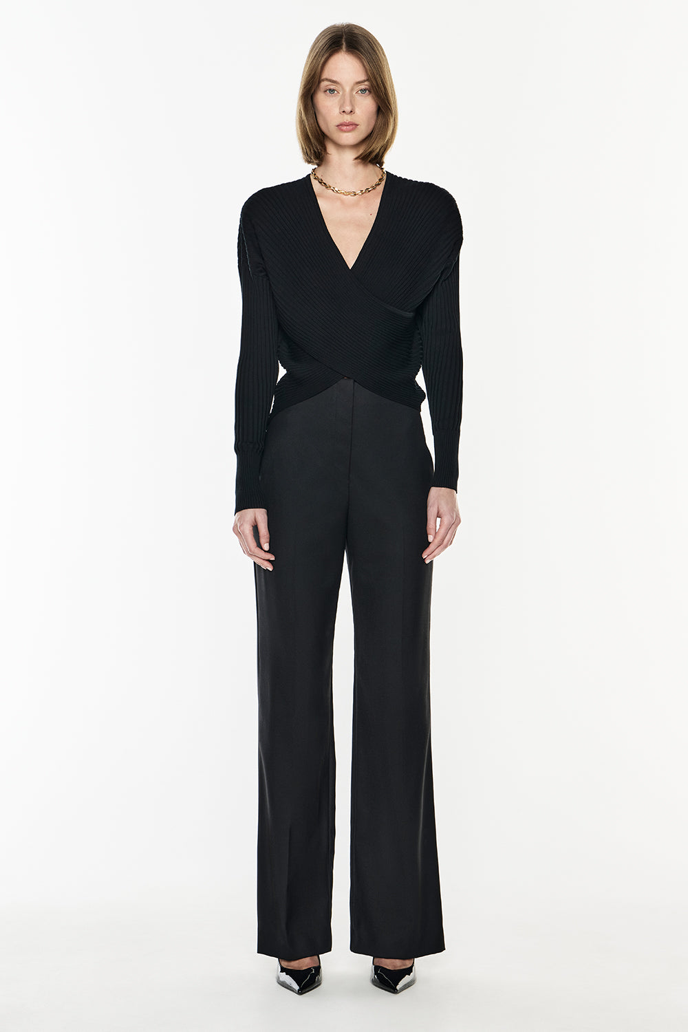 Image of a model wearing Pants. Productname: Major Suit High Waisted Pant in Black colour by brand - Manning Cartell