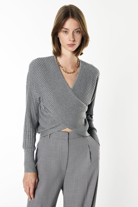 Image of a model wearing Tops. Productname: Storytellers Knit Top in Lead colour by brand - Manning Cartell