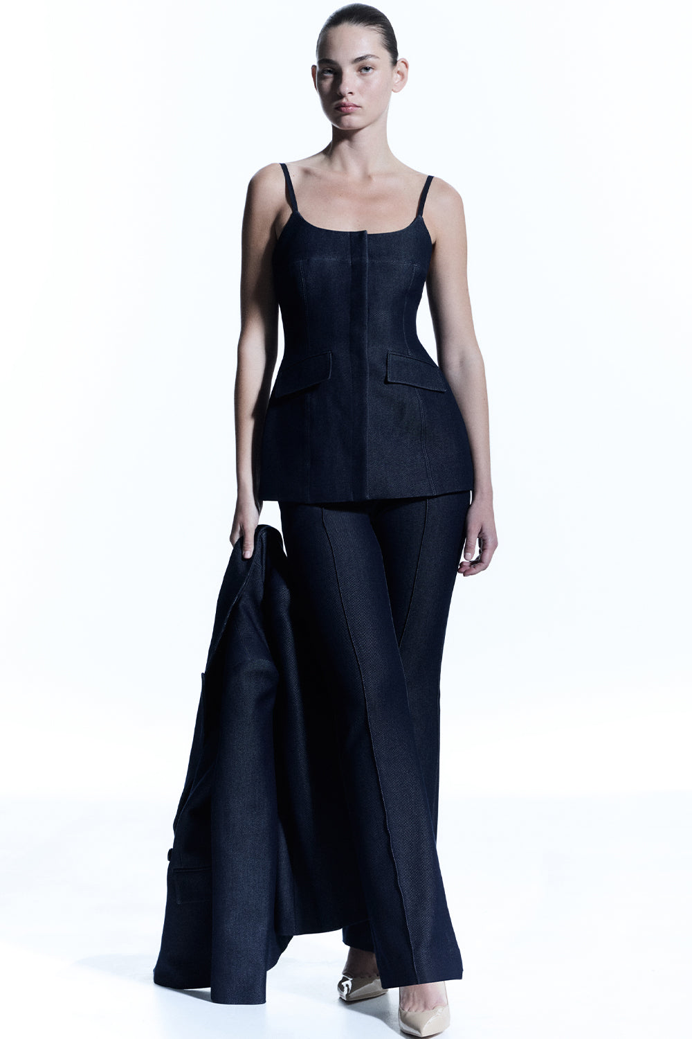 Image of a model wearing Tops. Productname: Dark Poetry Bustier in Indigo colour by brand - Manning Cartell