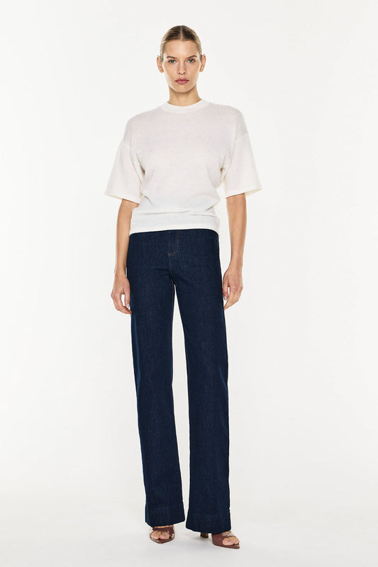 Image of a model wearing Tops. Productname: Light Years Knit Top in Ivory colour by brand - Manning Cartell