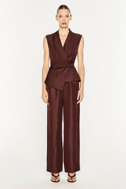 Image of a model wearing Tops. Product name - Rich Mix Wrap Top in Cocoa Brown colour by brand - MANNING CARTELL