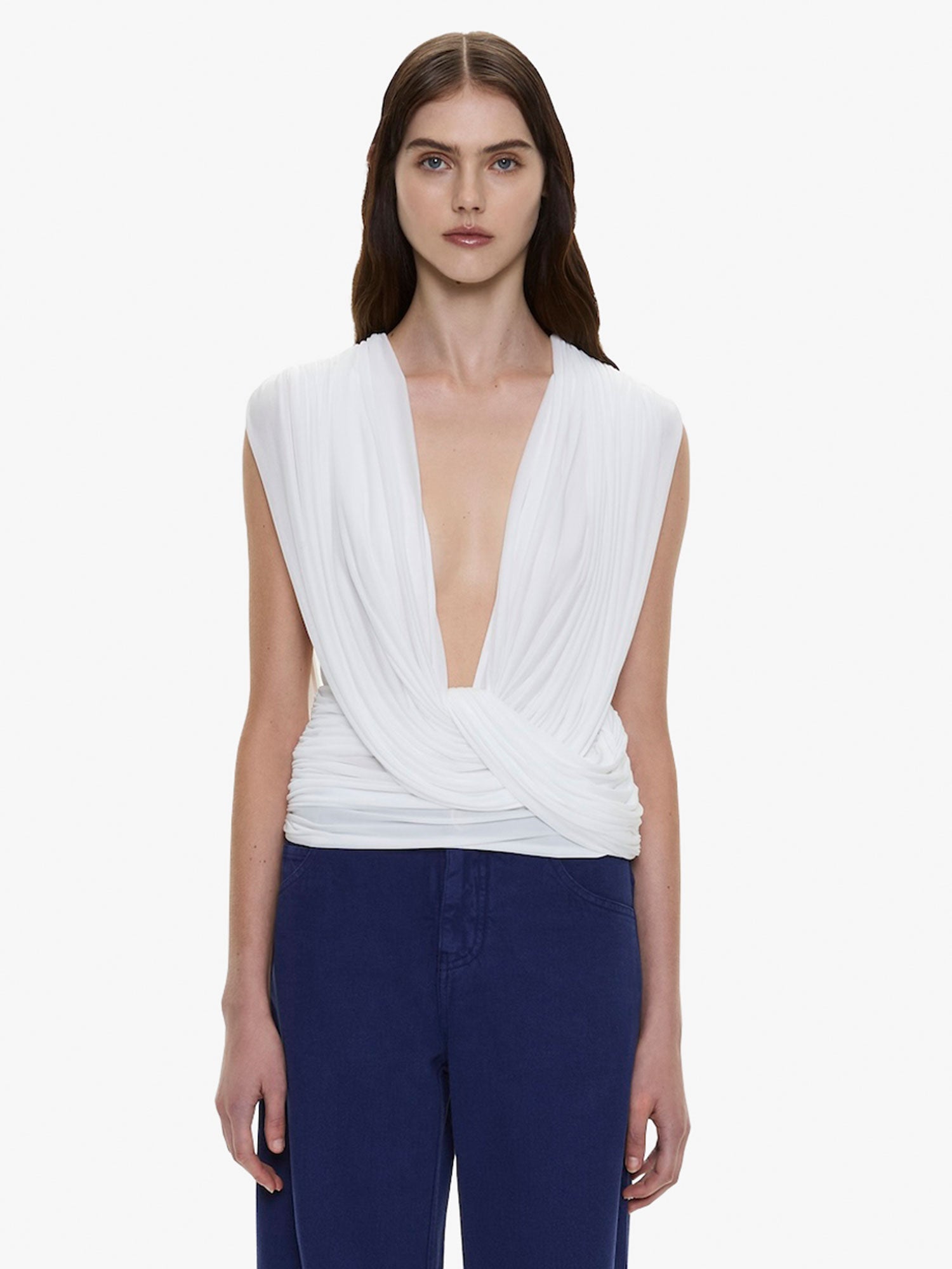 Image of a model wearing Tops. Product name - Ripple Drape Top in White colour by brand - CHRISTOPHER ESBER