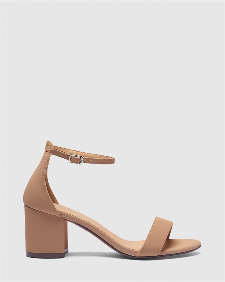 Image of Sandals. Product name - Ushaa Women's Strappy Low Heel Buff Novo Sandals in Buff colour by brand - NOVO
