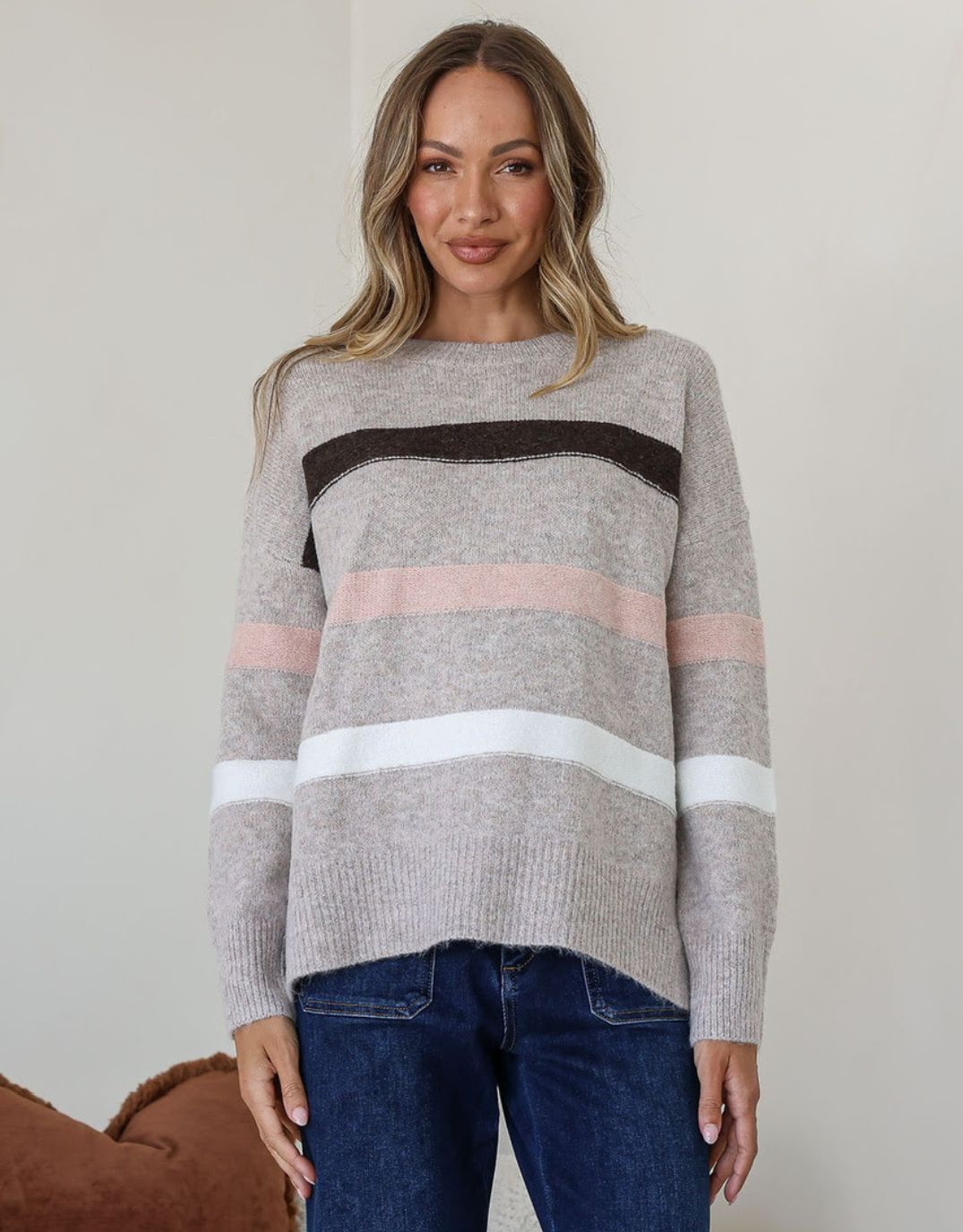 Image of a model wearing Outerwear. Productname: Aspen Stripe Knit - in Warm Beige/Choco/Blush colour by brand - 132 Fashion