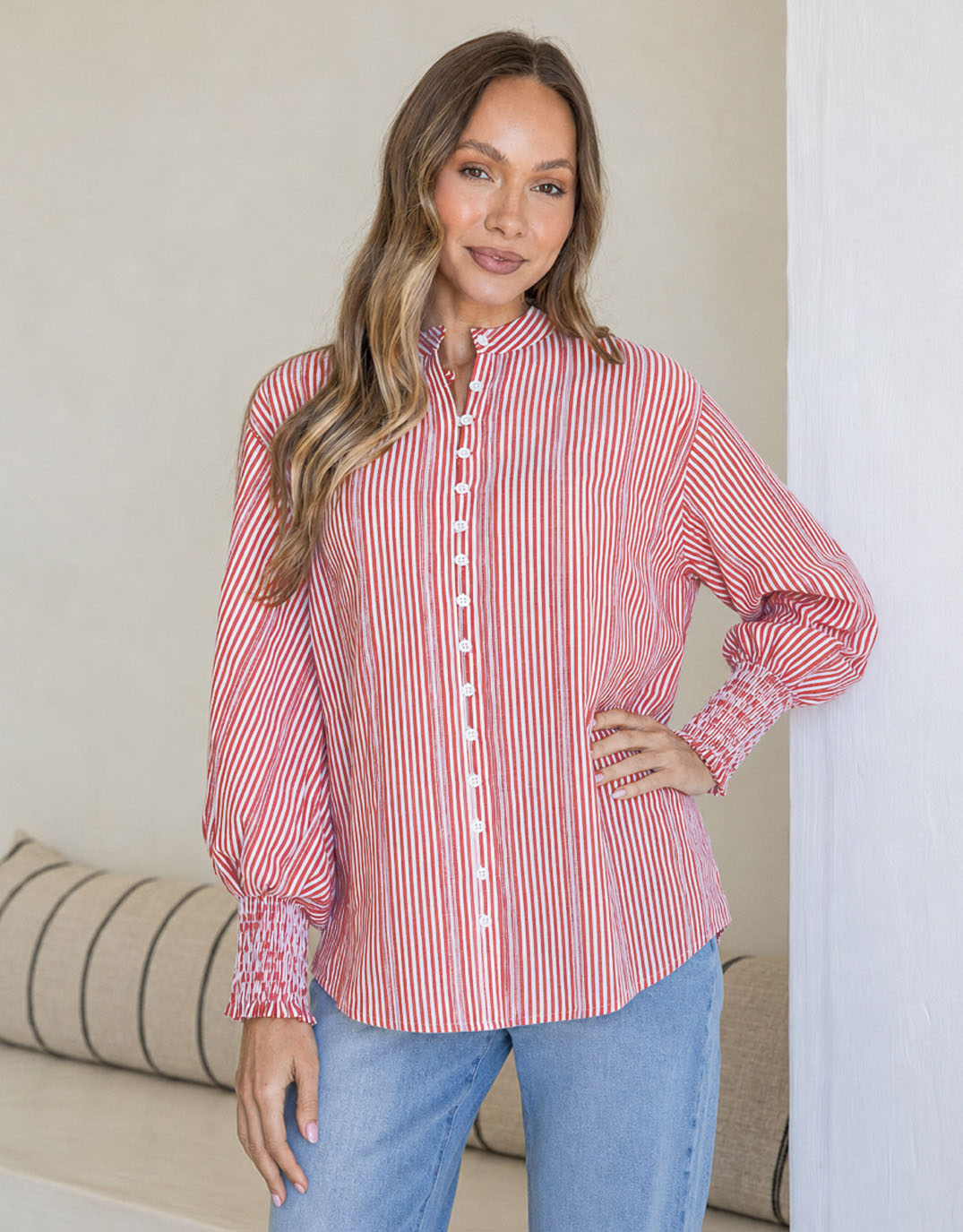 Image of a model wearing Tops. Product name - Elara Blouse Red/White Stripe in Red/White Stripe colour by brand - 132 Fashion
