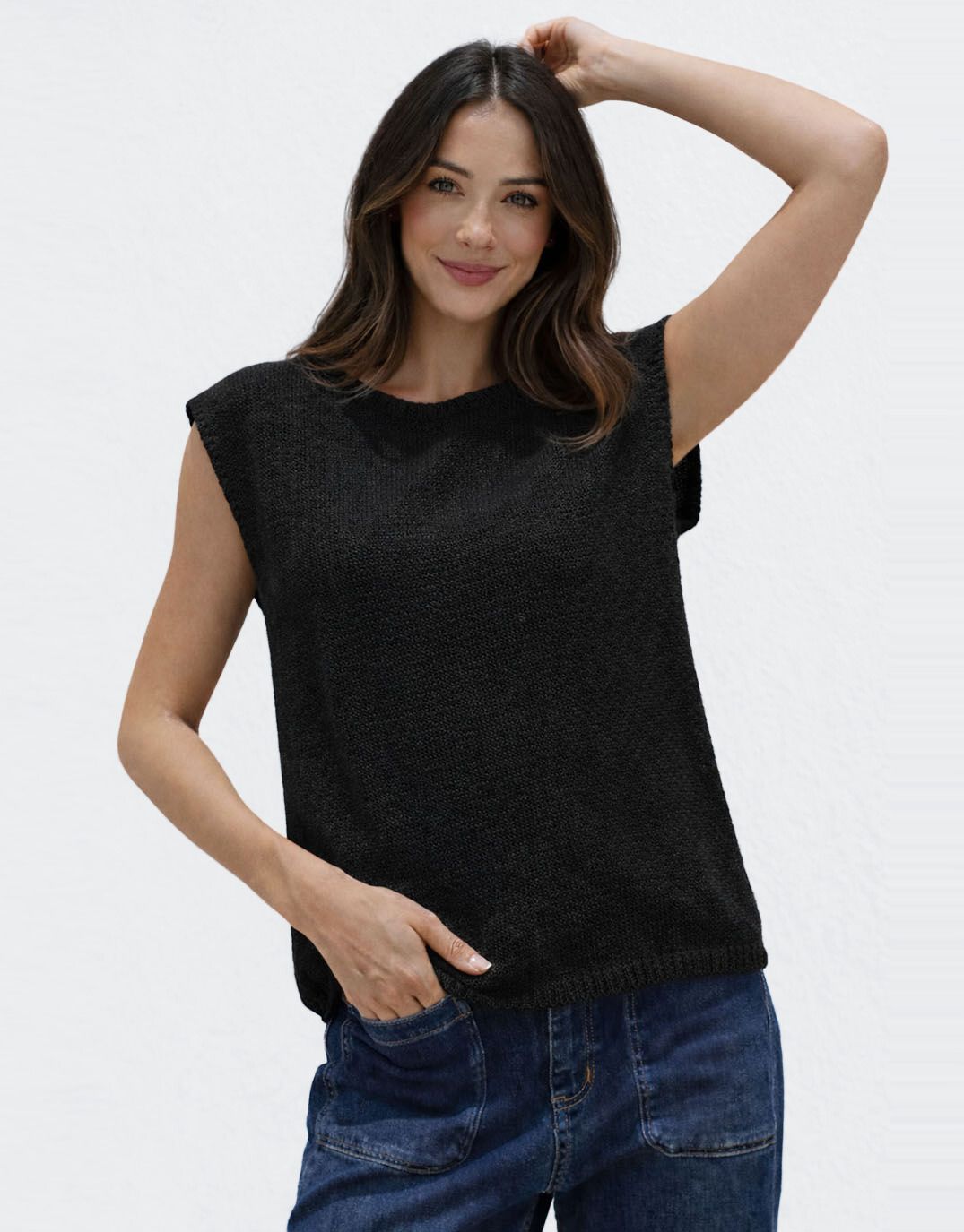 Image of a model wearing Outerwear. Productname: Evie Off Shoulder Knit - in Black colour by brand - 132 Fashion