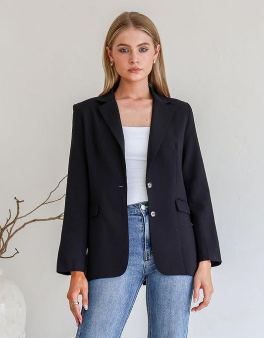 Image of a model wearing Outerwear. Productname: Jolie Cotton Blend Blazer - in Black colour by brand - 132 Fashion