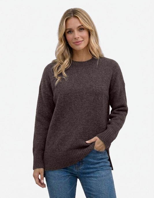 Image of a model wearing Outerwear. Product name - Maisie Hi-Low Knit Chocolate in Chocolate colour by brand - 132 Fashion