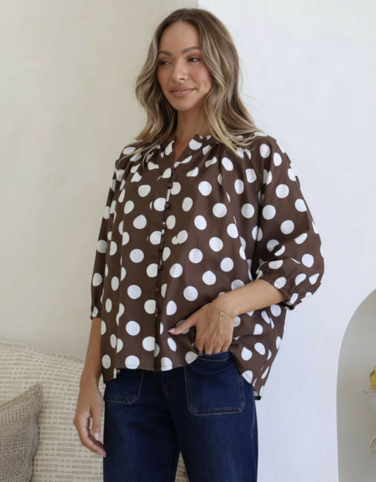 Image of a model wearing Tops. Productname: Malta Blouse - in Chocolate/White colour by brand - 132 Fashion