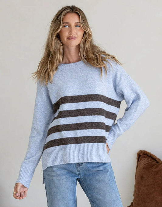 Image of a model wearing Outerwear. Product name - Manor Knit Blue/Chocolate in Blue/Chocolate colour by brand - 132 Fashion