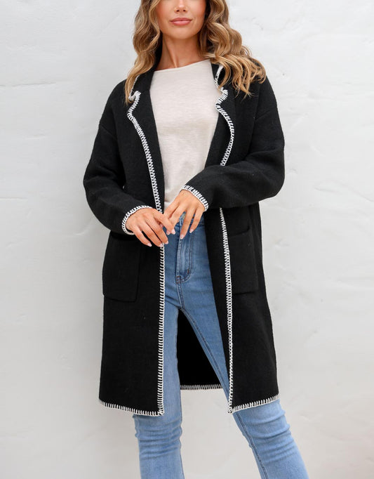 Image of a model wearing Outerwear. Productname: Noa Blanket Stitch Coatigan - in Black colour by brand - 132 Fashion