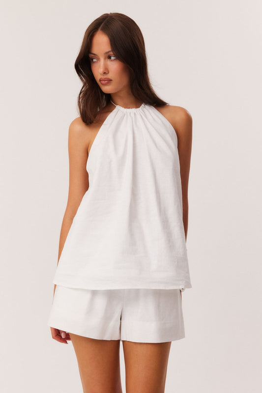 Image of a model wearing Tops. Productname: SNDYS ALYSSE TOP in White colour by brand - SNDYS