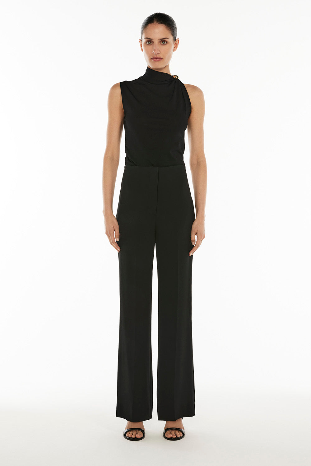 Image of a model wearing Pants. Productname: Flight Mode Pant in BLACK colour by brand - Manning Cartell