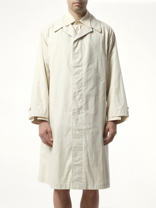 Image of a model wearing Outerwear. Productname: MAISON MARGIELA Trench Rain Coat in WHITE colour by brand - MAISON MARGIELA