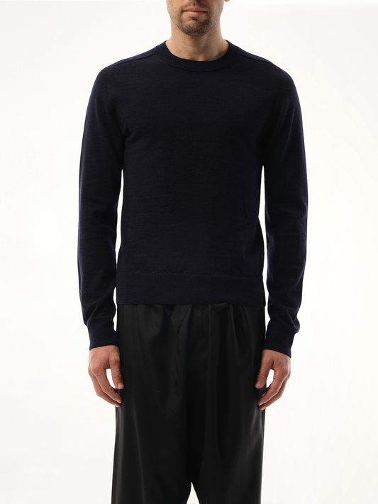 Image of a model wearing Outerwear. Product name - Wool Crewneck Sweater in Blue colour by brand - MAISON MARGIELA