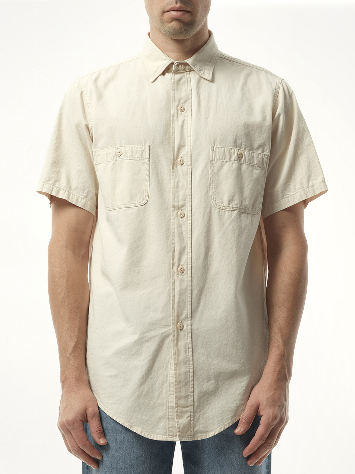Image of a model wearing Tops. Productname: MAISON MARGIELA Denim Short Sleeve Shirt in WHITE colour by brand - MAISON MARGIELA