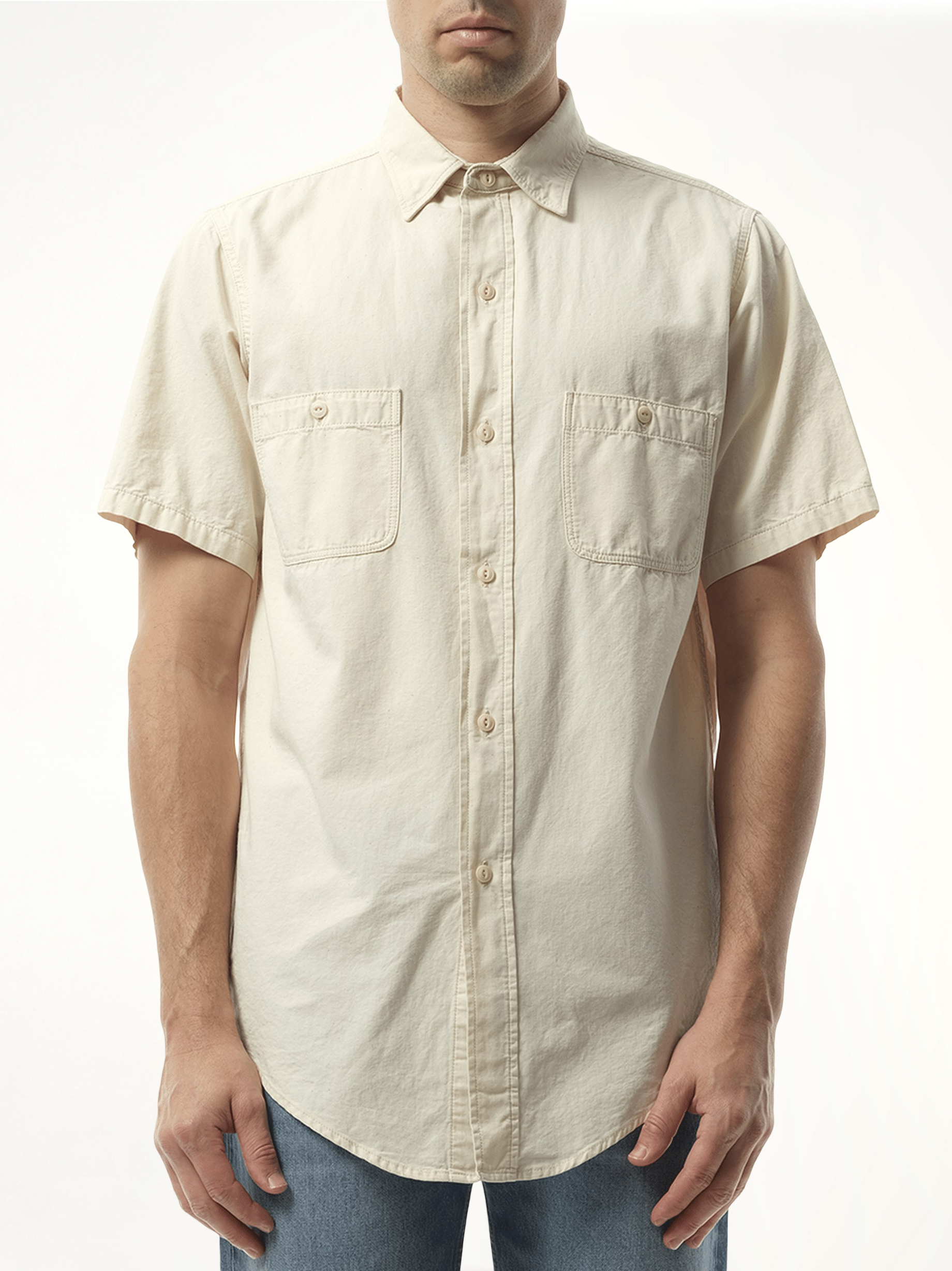 Image of a model wearing Tops. Productname: MAISON MARGIELA Denim Short Sleeve Shirt in WHITE colour by brand - MAISON MARGIELA