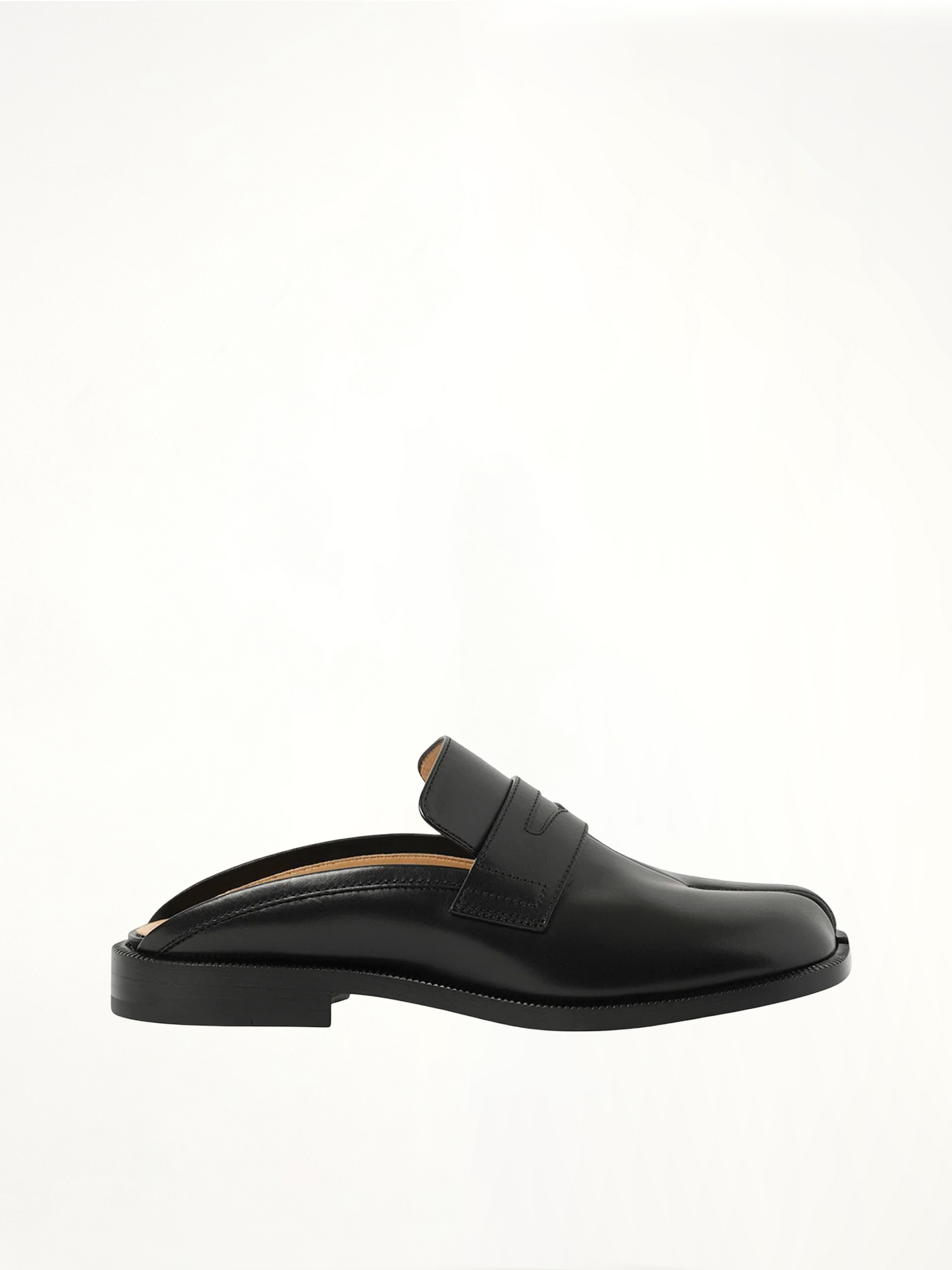 Image of Flats. Product name - Tabi City Loafer Mule in Black colour by brand - MAISON MARGIELA