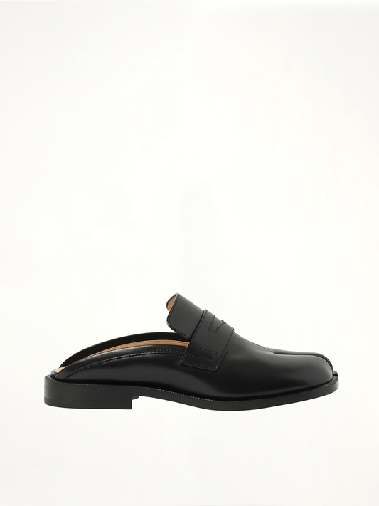 Image of Flats. Product name - Tabi City Loafer Mule in Black colour by brand - MAISON MARGIELA