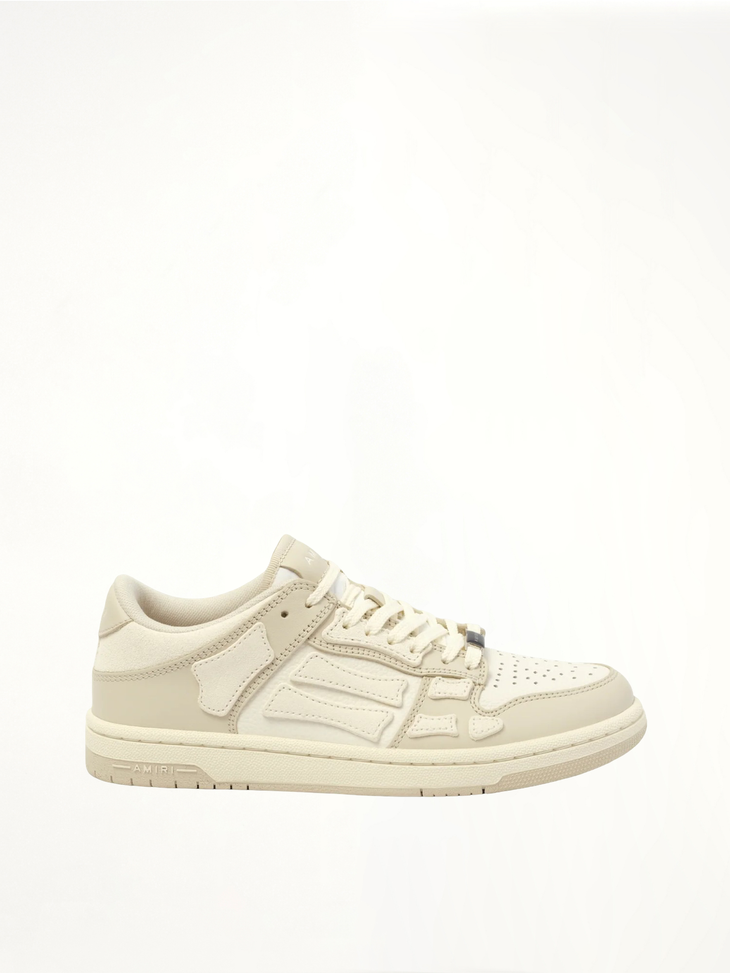 Image of Sneakers. Product name - Skeleton Top Low Sneaker in Alabaster colour by brand - AMIRI