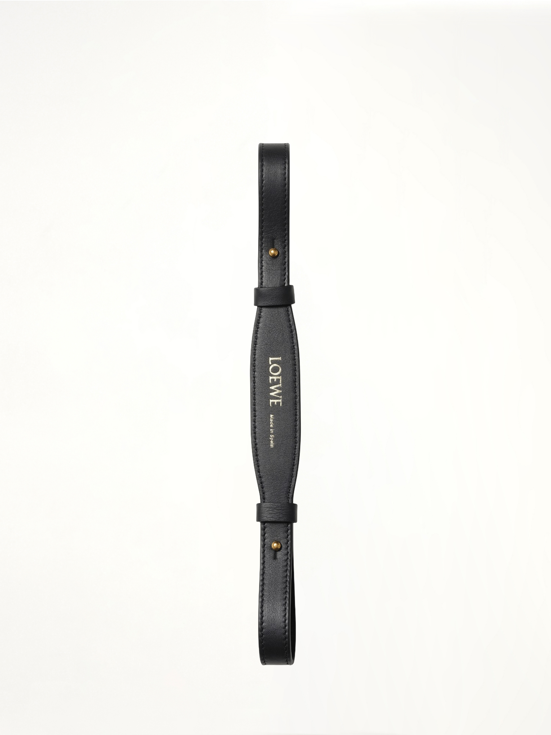 Image of a model wearing Shorts. Product name - Branded Short Strap in Black colour by brand - LOEWE