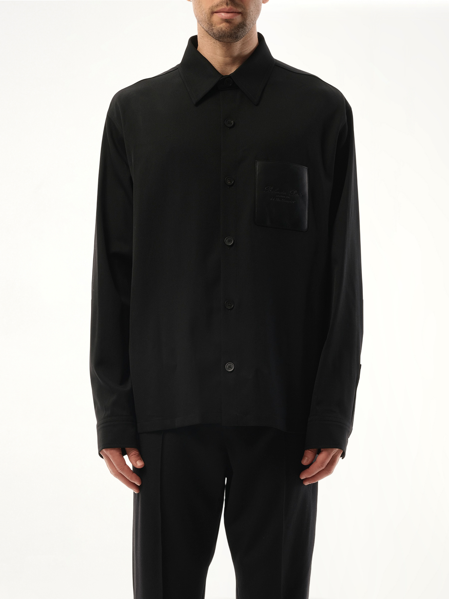 Image of a model wearing Outerwear. Productname: BALMAIN Couture Label GDP Overshirt in Black colour by brand - BALMAIN