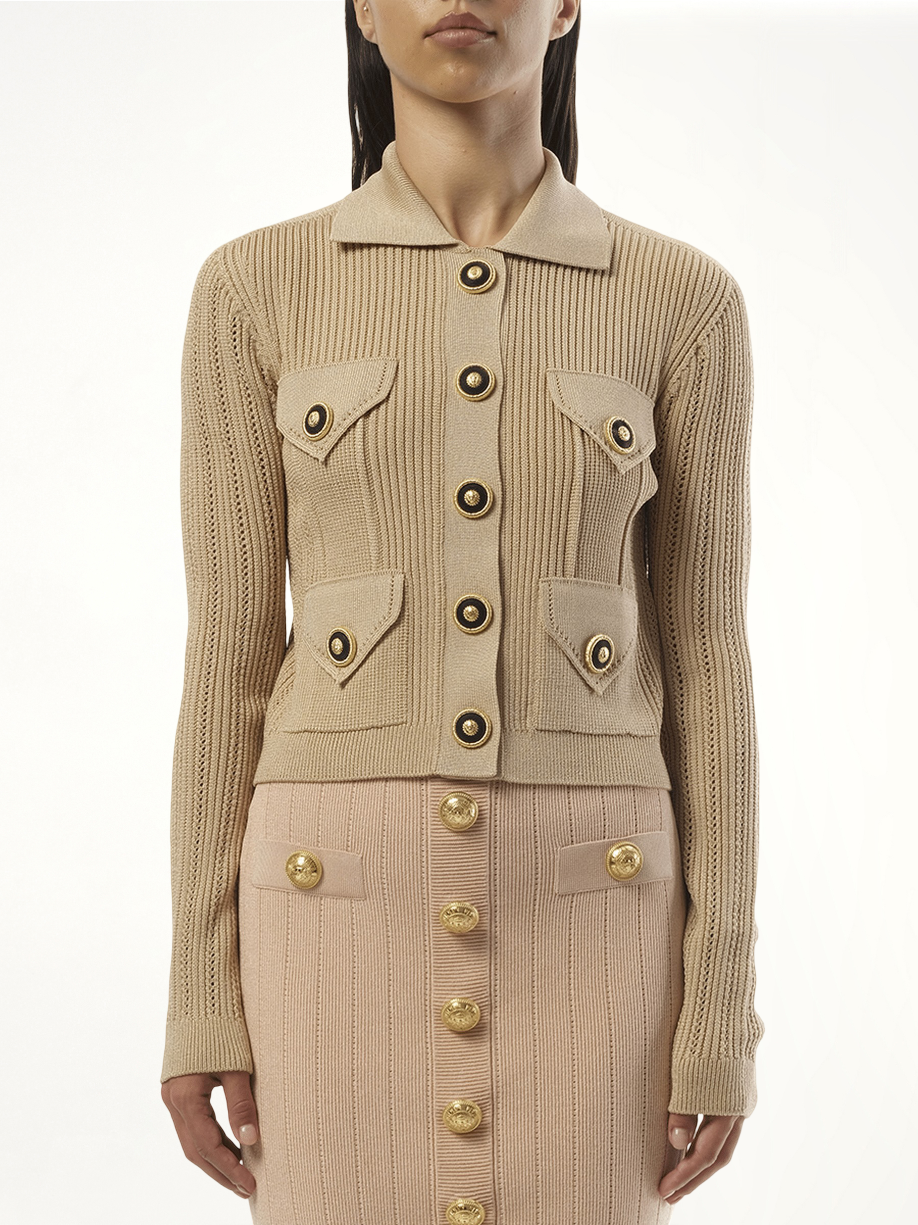 Image of a model wearing Outerwear. Productname: BALMAIN 4 Pockets Buttoned Ribbed Knit Cardigan in PINK colour by brand - BALMAIN