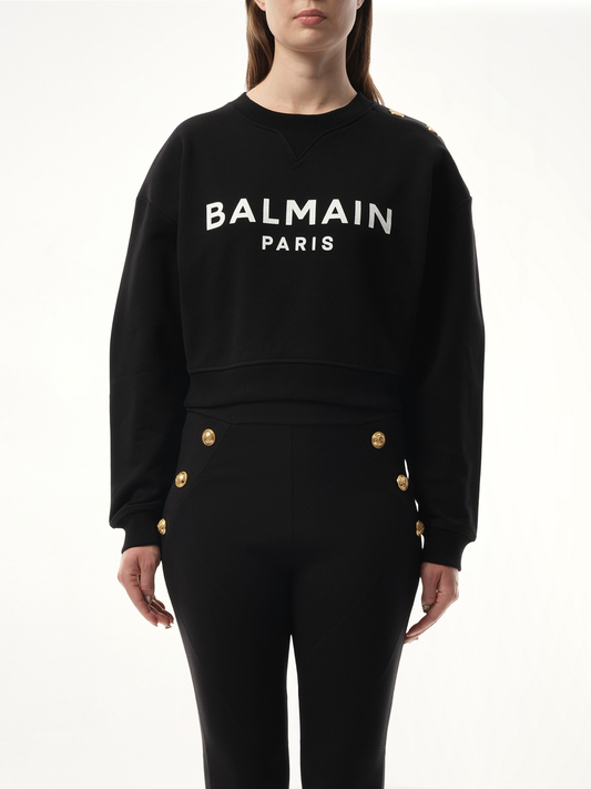 Image of a model wearing Outerwear. Productname: BALMAIN 3 Button Balmain Printed Sweatshirt in BLACK/WHITE colour by brand - BALMAIN