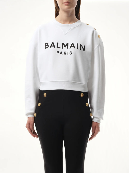 Image of a model wearing Outerwear. Product name - 3 Button Balmain Printed Sweatshirt in White colour by brand - BALMAIN