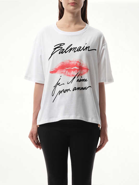 Image of a model wearing Tops. Productname: BALMAIN Balmain Kiss Print T-Shirt in WHITE colour by brand - BALMAIN