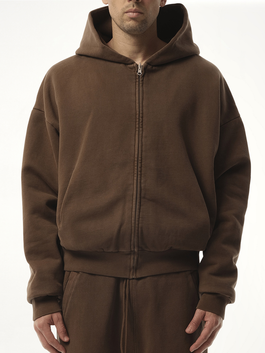 Image of a model wearing Outerwear. Productname: ENTIRE STUDIOS Thermal Hood in BROWN colour by brand - ENTIRE STUDIOS